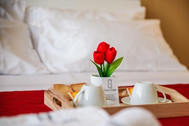 Acomodação com café da manhã  Quinto Stabile Rooms&suite